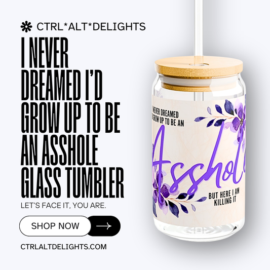 Glass tumbler with bamboo lid and straw featuring the quote 'I Never Dreamed I’d Grow Up to Be an Asshole.' Perfect funny gift for sarcastic friends or as a unique addition to your drinkware collection.