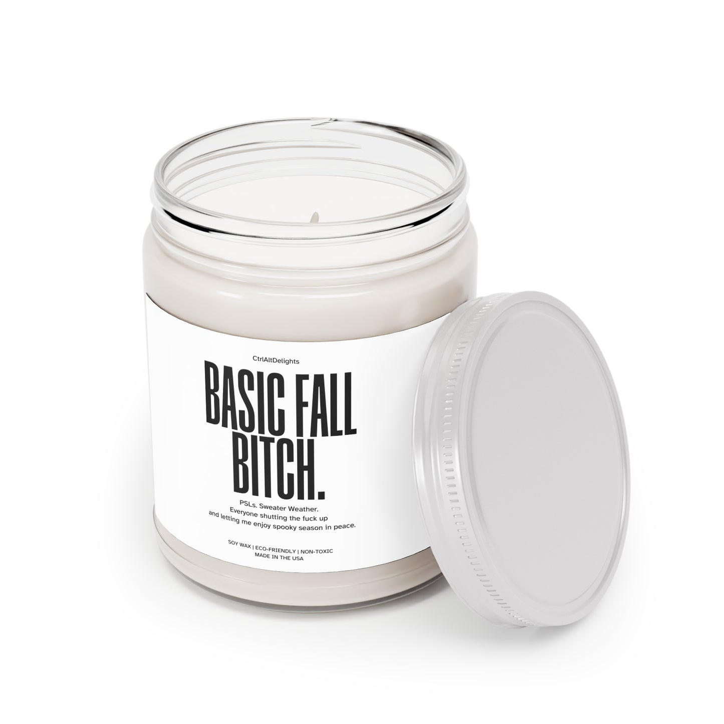 Basic Fall Bitch soy wax candle, featuring a funny and bold label perfect for autumn vibes. The candle boasts eco-friendly and non-toxic ingredients, making it a great gift for PSL lovers and those enjoying cozy fall vibes.