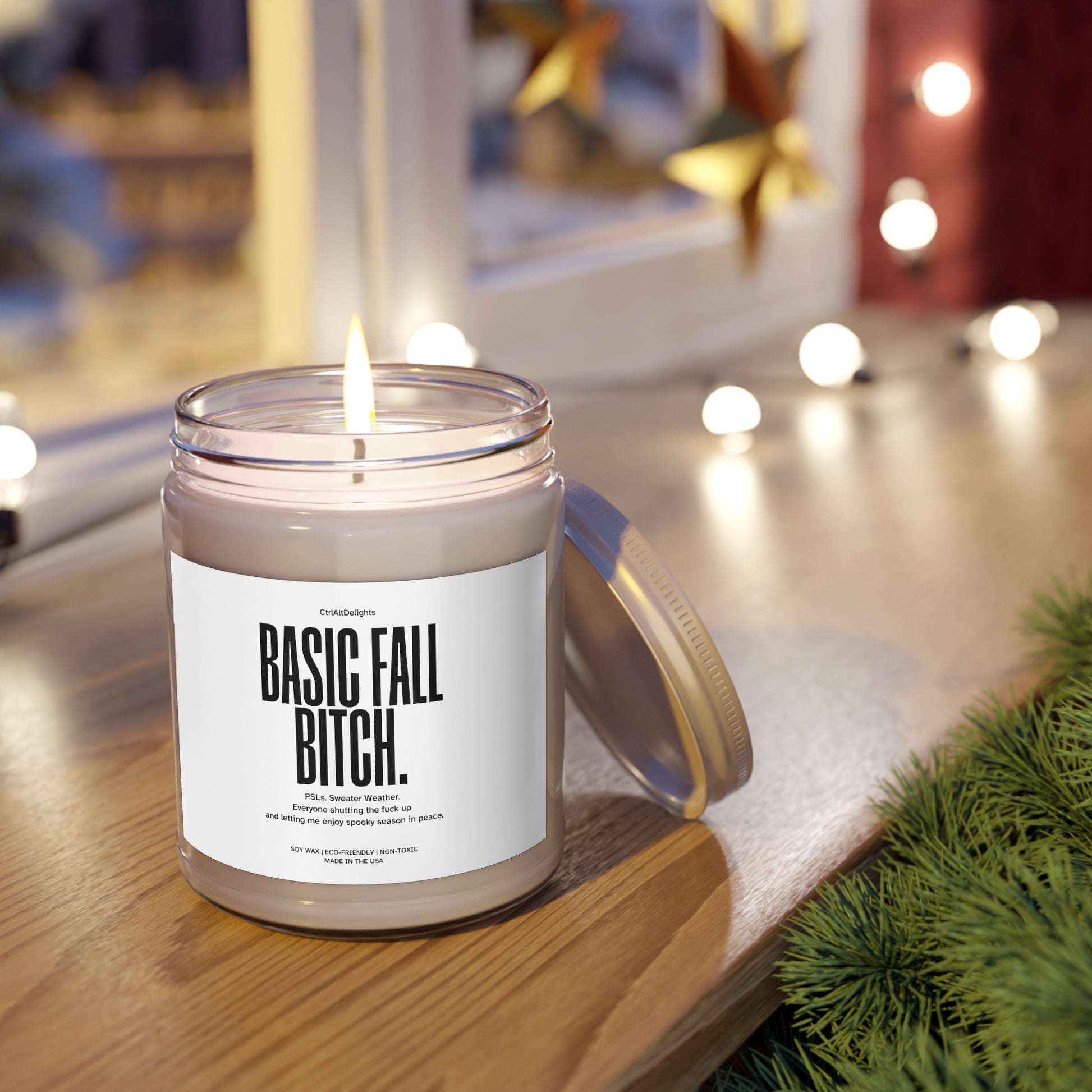 Basic Fall Bitch soy wax candle, featuring a funny and bold label perfect for autumn vibes. The candle boasts eco-friendly and non-toxic ingredients, making it a great gift for PSL lovers and those enjoying cozy fall vibes.