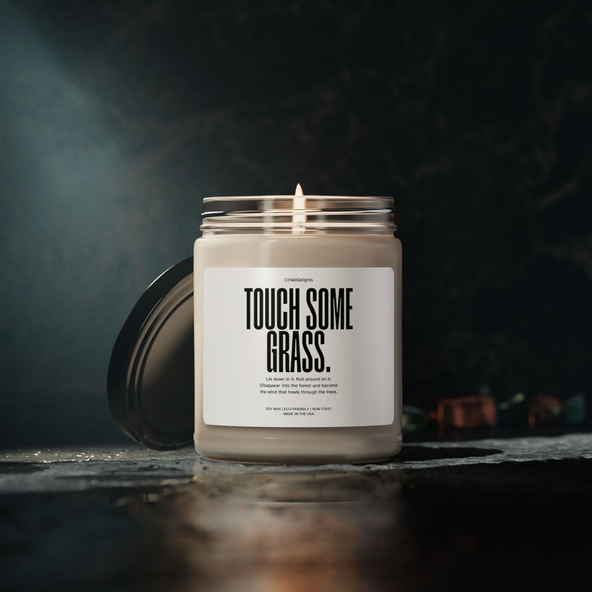 This Touch Some Grass candle, made from eco-friendly soy wax, features a playful, minimalist label with a humorous message. With a clear jar and black lid, its a fun novelty gift for anyone who enjoys unique, home decor. Perfect for gifting!