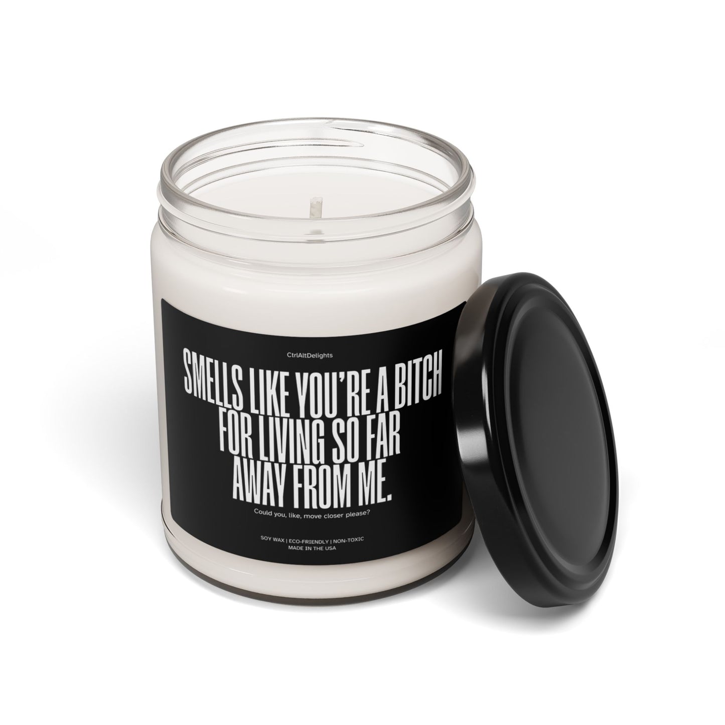 This eco-friendly soy candle features a bold, funny message for long-distance friends: Smells like you’re a bitch for living so far away from me. Perfect sarcastic gift to bring humor and fun to any space.