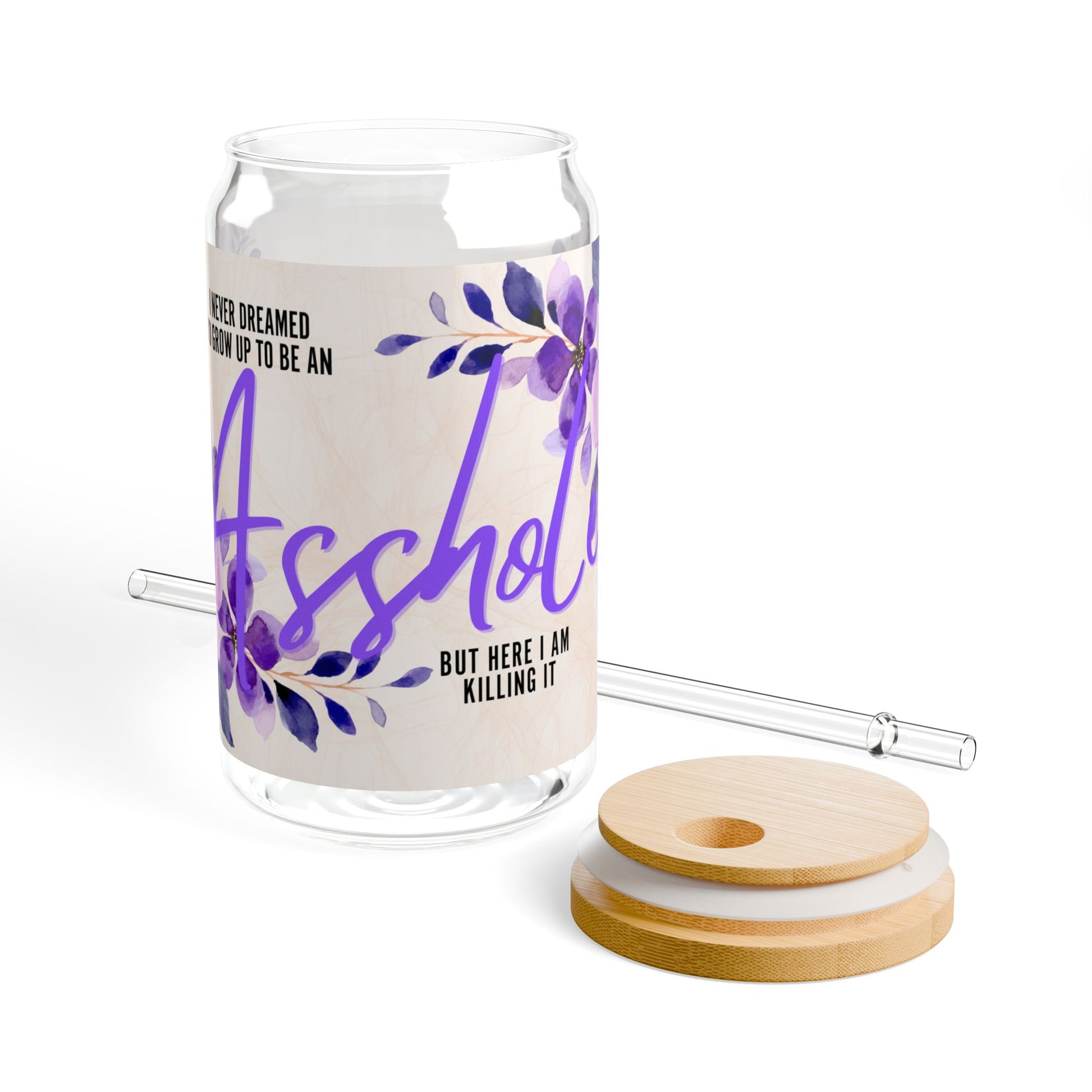 Glass tumbler with bamboo lid and straw featuring the quote 'I Never Dreamed I’d Grow Up to Be an Asshole.' Perfect funny gift for sarcastic friends or as a unique addition to your drinkware collection.