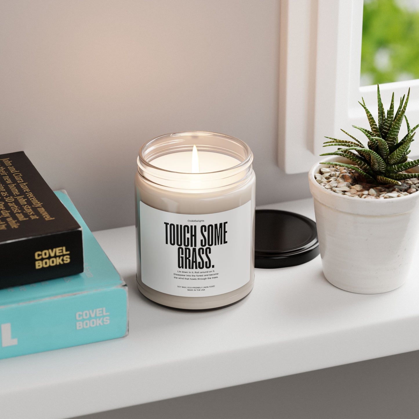 This Touch Some Grass candle, made from eco-friendly soy wax, features a playful, minimalist label with a humorous message. With a clear jar and black lid, its a fun novelty gift for anyone who enjoys unique, home decor. Perfect for gifting!