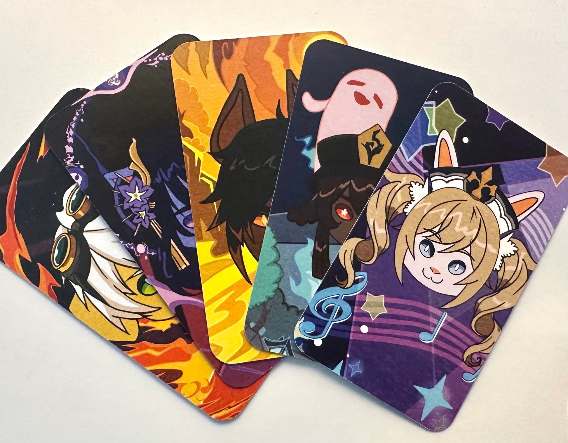 A set of Genshin Impact characters reimagined as adorable animals on TCG cards. These holographic cards feature detailed art of fan-favorite characters. Perfect for collectors or gifting.