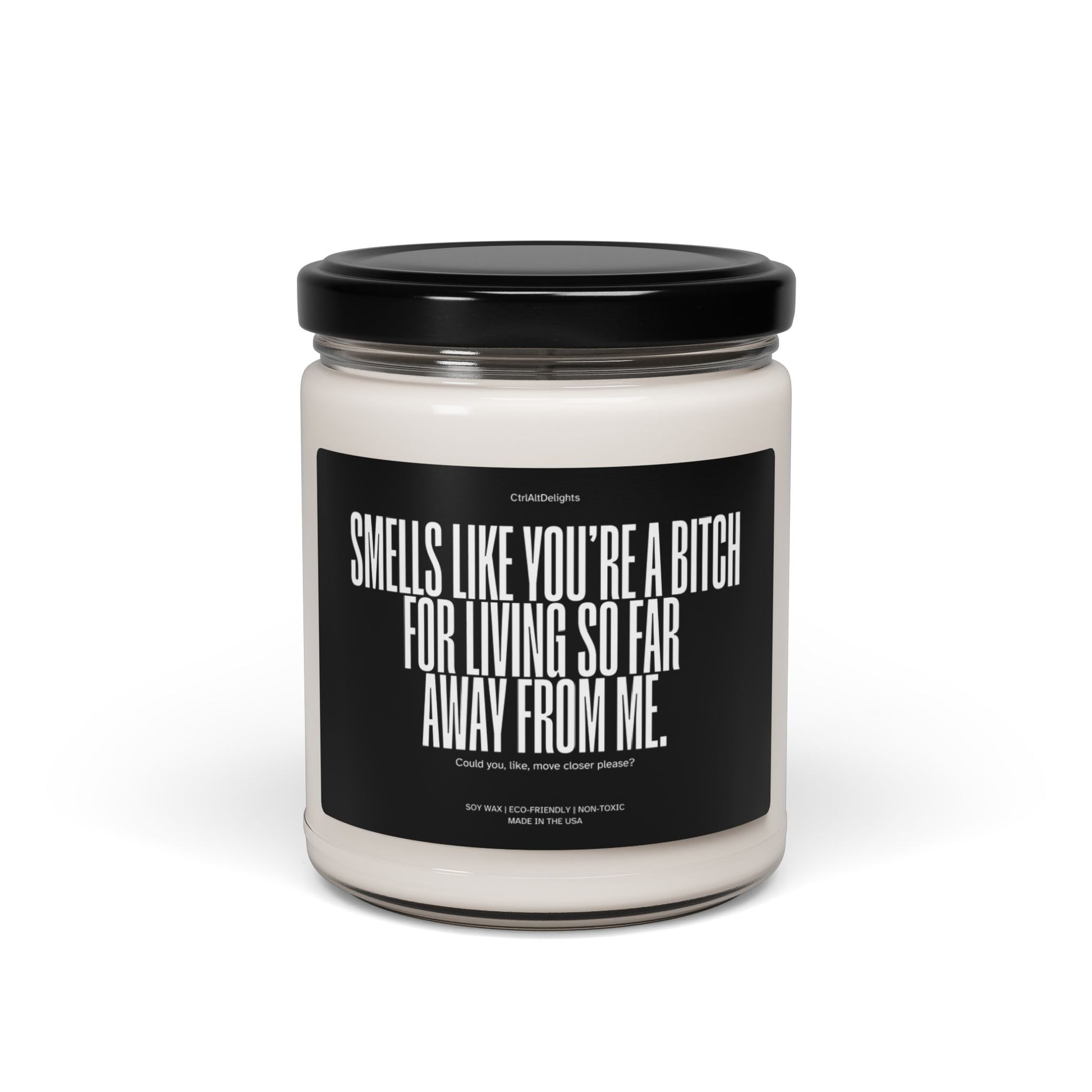 This eco-friendly soy candle features a bold, funny message for long-distance friends: Smells like you’re a bitch for living so far away from me. Perfect sarcastic gift to bring humor and fun to any space.