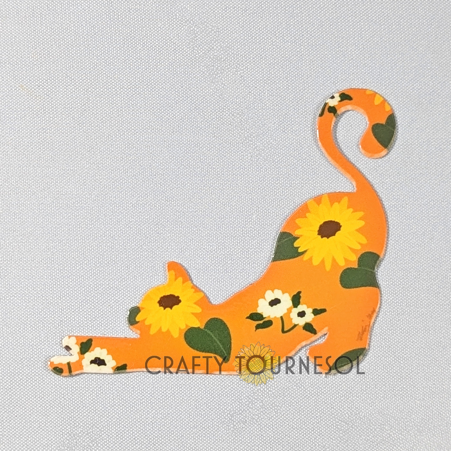 "Orange cat silhouette sticker decorated with sunflowers and white flowers, perfect for cat lovers and fans of floral decor. Adds a charming, nature-inspired touch to notebooks, laptops, and personal items."