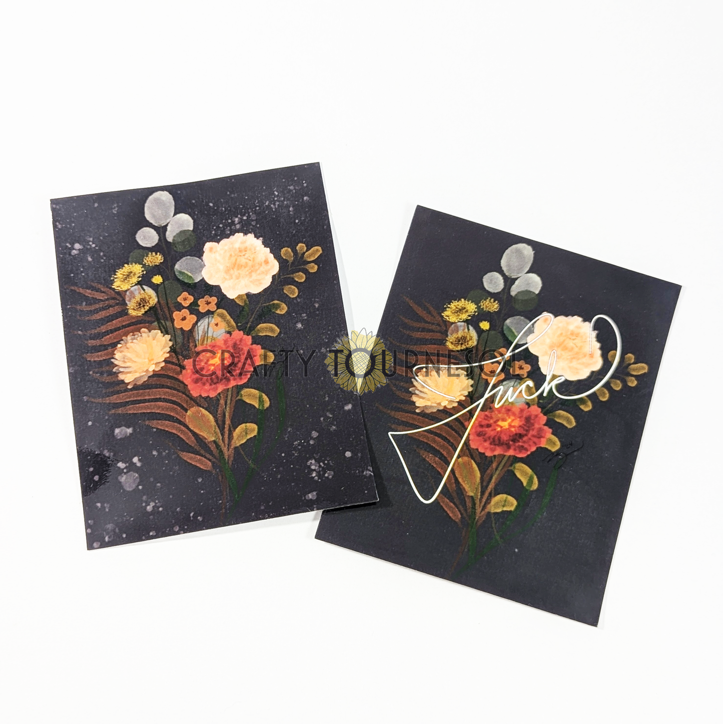 "Set of two floral art stickers with vintage-inspired bouquets on black backgrounds, one featuring elegant script text that reads 'Fuck'. Perfect for adding a touch of botanical charm to journals, laptops, or decor."