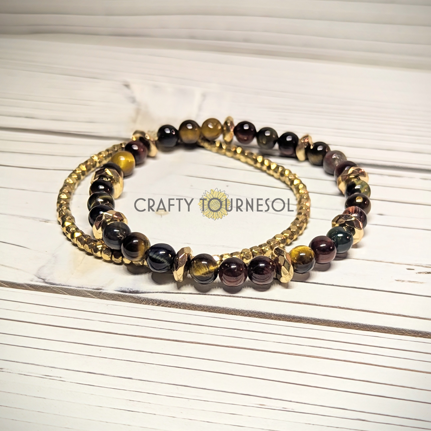 "Elegant bracelet set featuring tiger's eye and gold beads, accompanied by coordinating bracelet with gold beads, perfect for adding a touch of sophistication and natural charm. Ideal for jewelry lovers seeking stylish, earthy accessories with a hint of luxury."