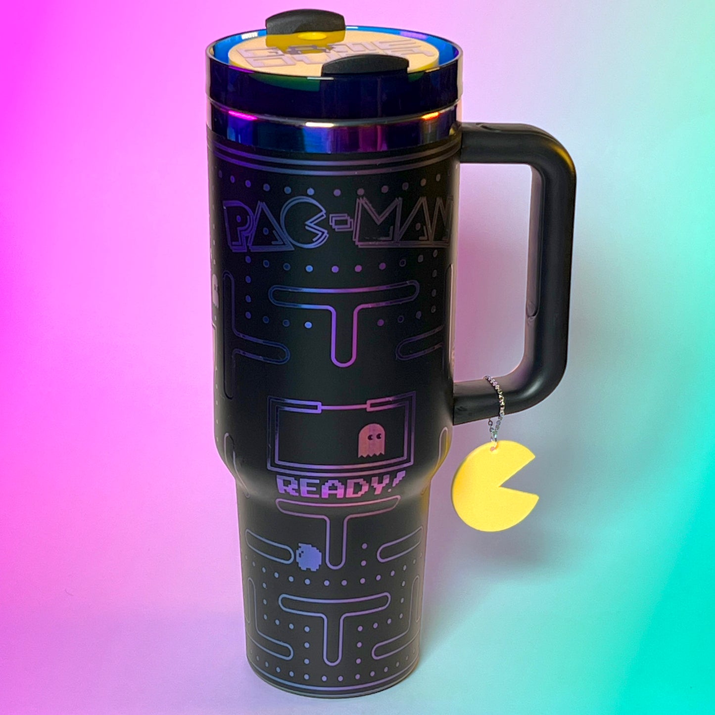 Laser engraved 40oz stainless steel tumbler featuring a retro Pac-Man design with iconic maze and ghosts, insulated to keep drinks hot or cold, perfect for gamers and retro arcade enthusiasts on the go.