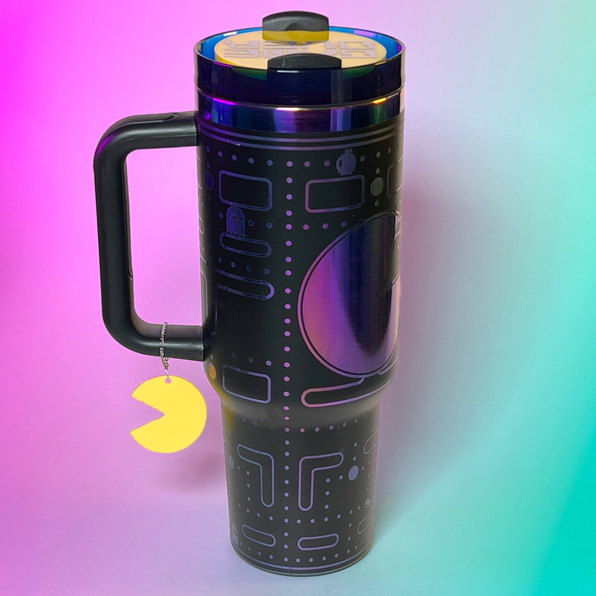 Laser engraved 40oz stainless steel tumbler featuring a retro Pac-Man design with iconic maze and ghosts, insulated to keep drinks hot or cold, perfect for gamers and retro arcade enthusiasts on the go.