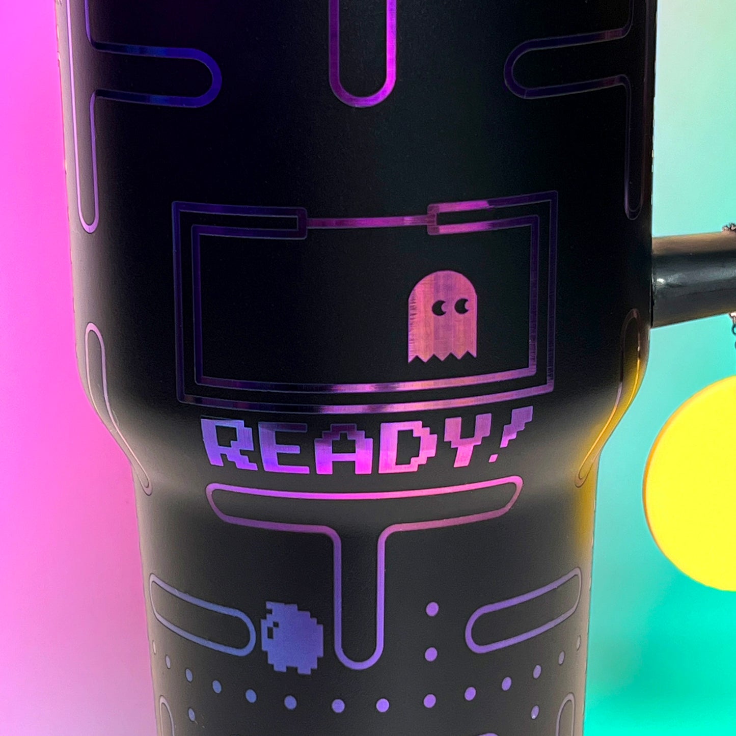 Laser engraved 40oz stainless steel tumbler featuring a retro Pac-Man design with iconic maze and ghosts, insulated to keep drinks hot or cold, perfect for gamers and retro arcade enthusiasts on the go.