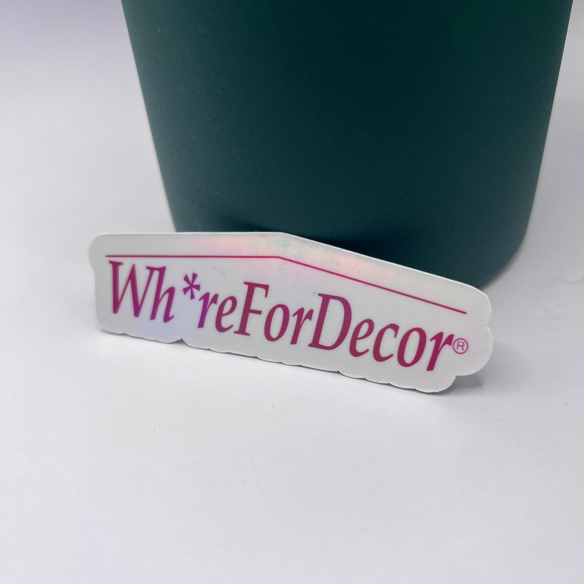 Holographic Wh*re for Decor vinyl sticker with a home goods-inspired design. Perfect for decor enthusiasts and anyone who loves a snarky touch.