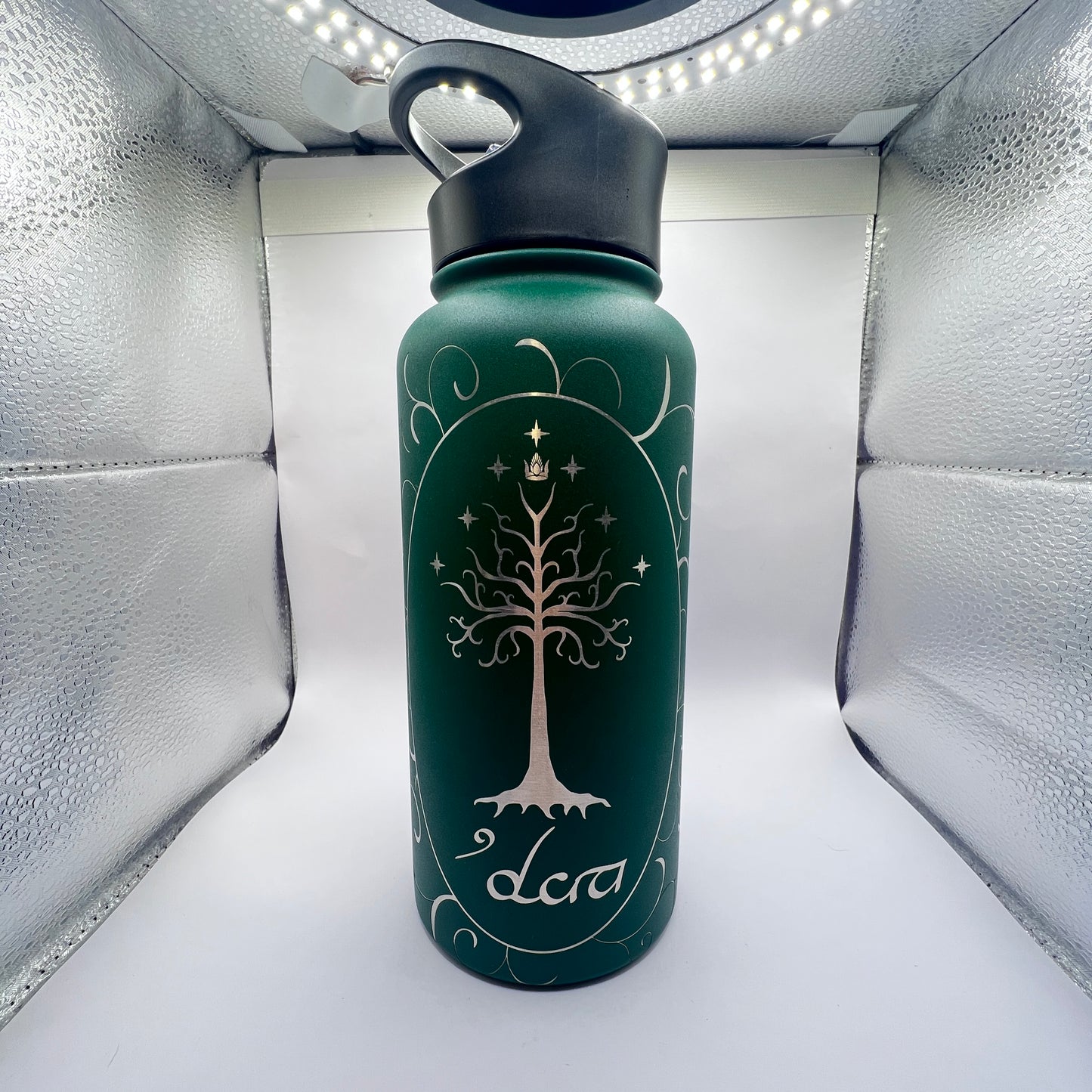 Laser engraved stainless steel water bottle featuring the Tree of Gondor from Lord of the Rings. Includes personalized name option. Perfect gift for LOTR fans