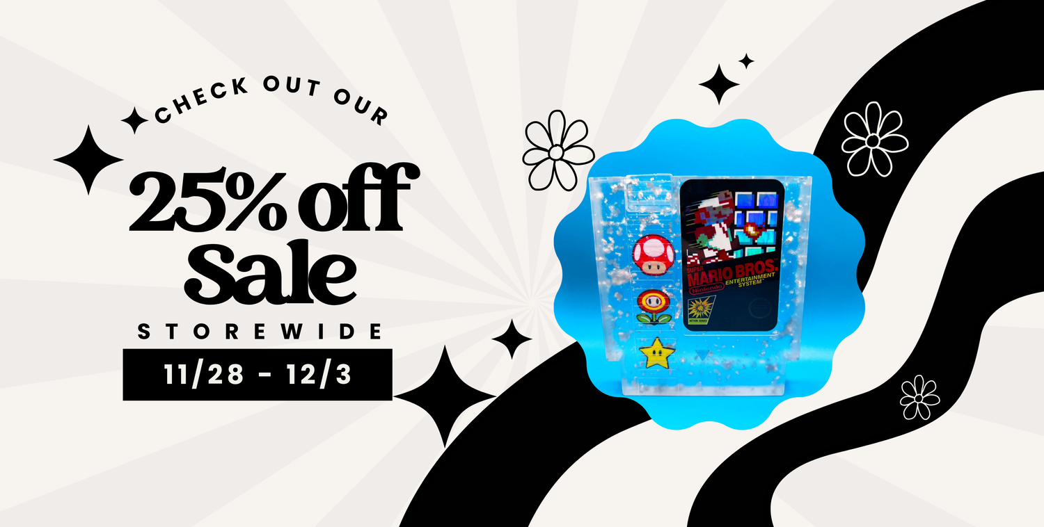 banner image advertising black friday sale of 25% off the whole store. Featuring a Super Mario Bros resin NES cartridge