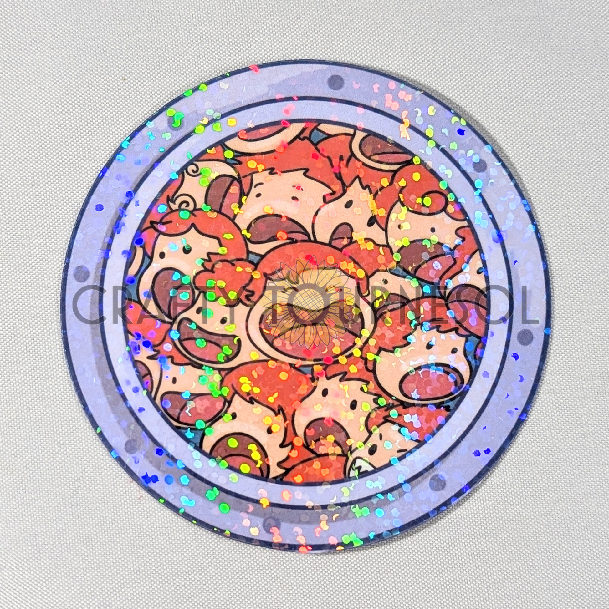 "Holographic sticker featuring adorable, colorful fish, little sisters from the Ponyo anime-inspired design, packed together in a circular frame. Perfect for fans of whimsical, aquatic-themed art looking to add sparkle to their decor."