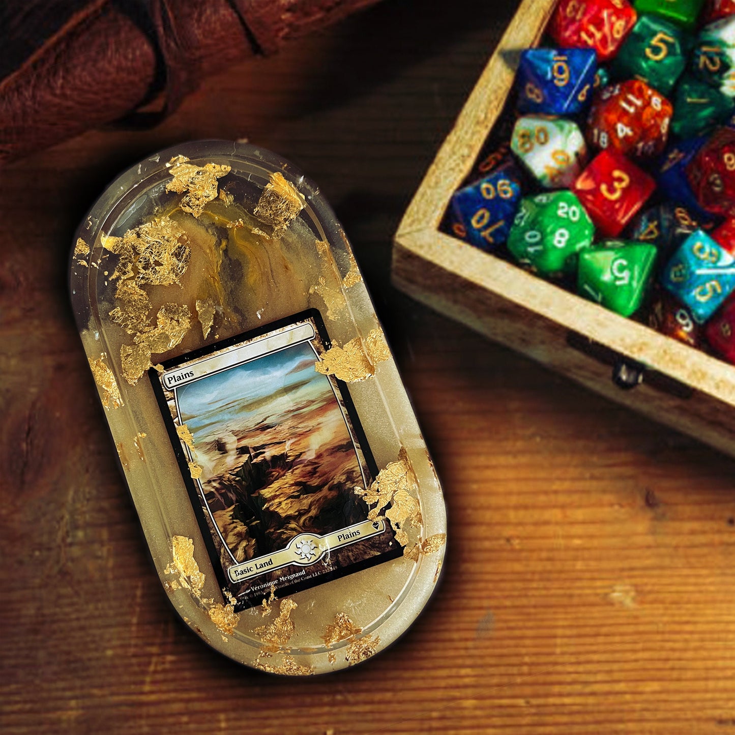 Handmade resin trinket tray featuring a Magic the Gathering Plains land design with champagne tones + gold foil accents. Perfect for dice, cards, or small items, ideal for gamers and collectors. Unique addition to any Magic the Gathering collection.