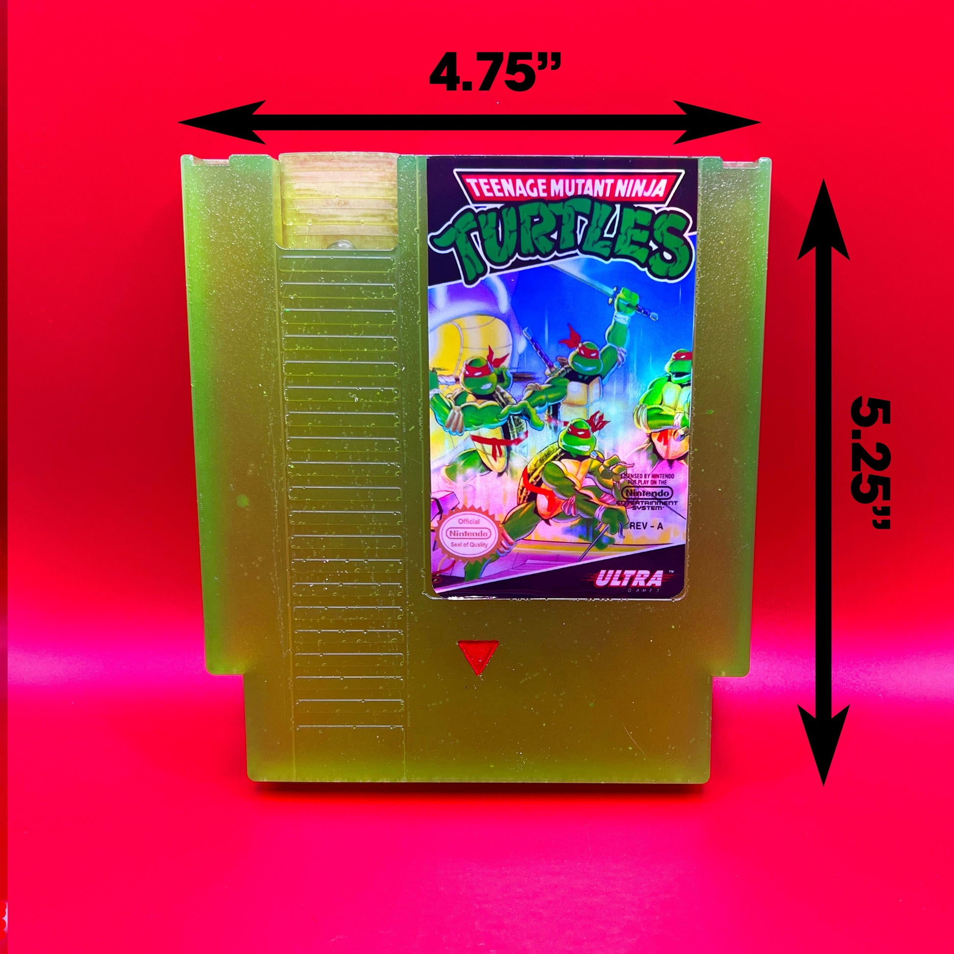 This glowing Teenage Mutant Ninja Turtles NES cartridge is a retro, geeky collectible display. Handmade with glowing elements, it's perfect for nostalgic gamers and TMNT fans as a unique gift or decor.