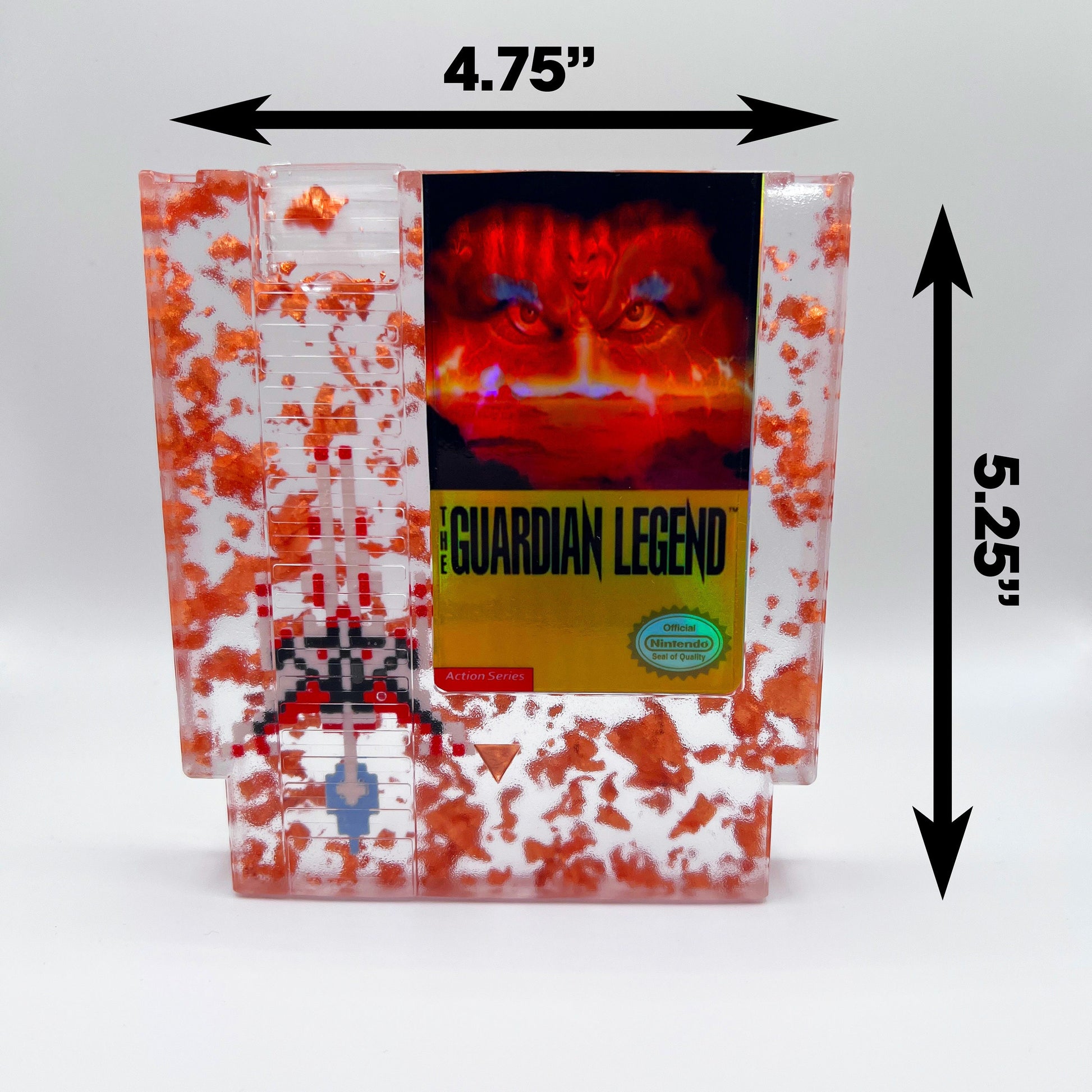 Handcrafted The Guardian Legend custom NES cartridge featuring vibrant orange and holographic elements. This retro gaming art piece adds a unique flair to any collection.