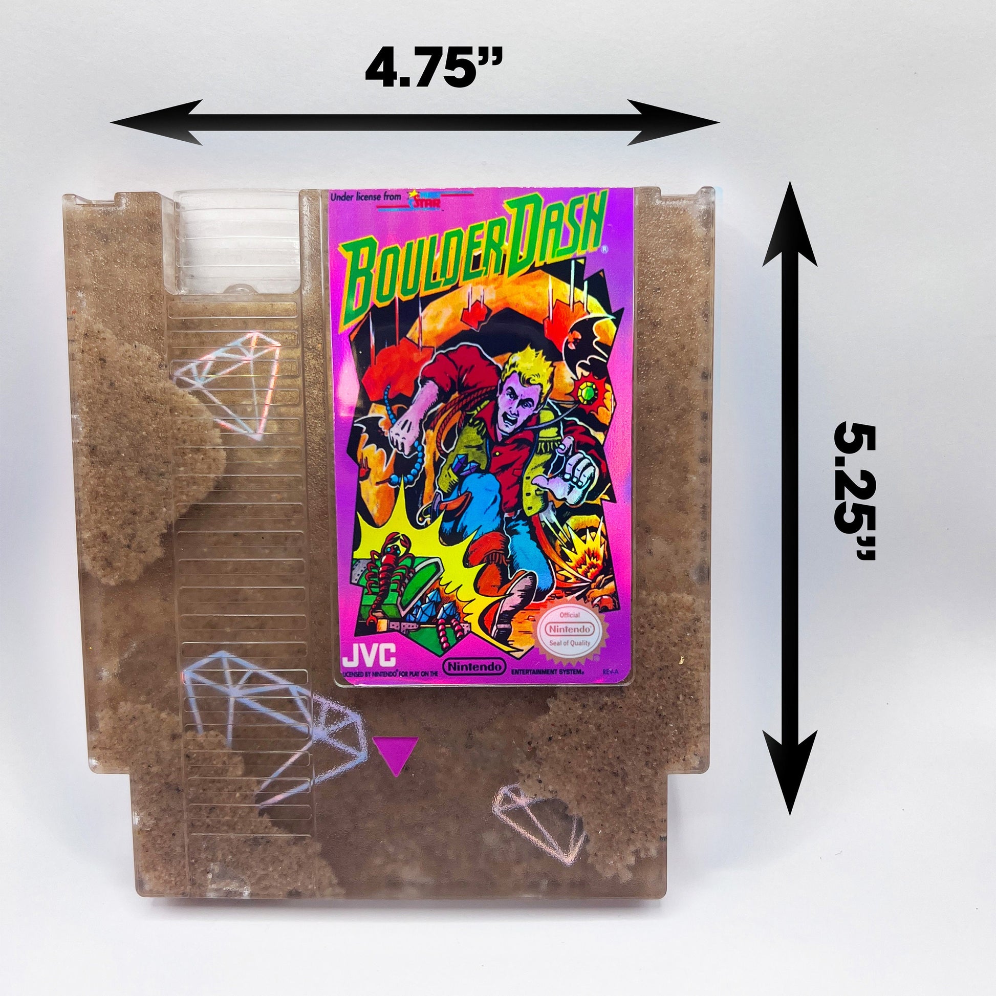 Handmade Boulder Dash NES cartridge art featuring intricate sand and diamond designs on a transparent casing. A perfect gift for retro gaming enthusiasts.