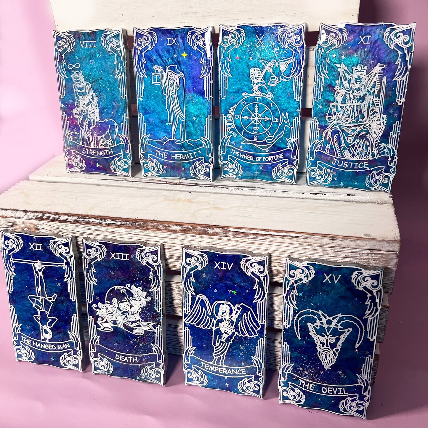 Handmade Major Arcana tarot cards featuring a galaxy theme with vibrant colors. Each card is crafted in resin, showcasing intricate designs perfect for tarot readings, spiritual use, or decorative display.