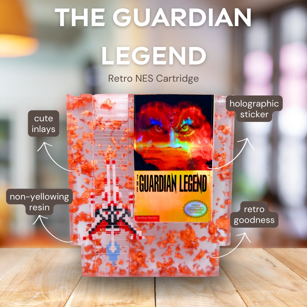 Handcrafted The Guardian Legend custom NES cartridge featuring vibrant orange and holographic elements. This retro gaming art piece adds a unique flair to any collection.