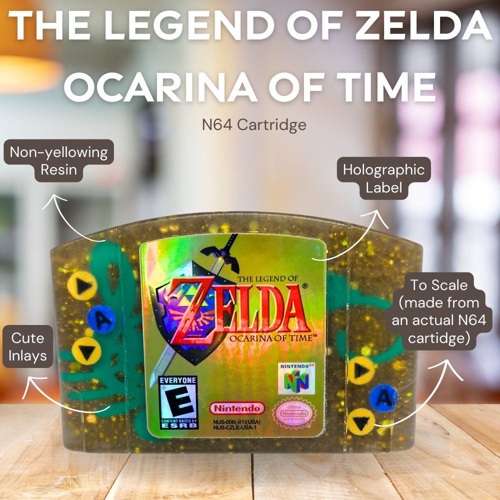 This handmade Zelda Ocarina of Time resin cartridge features vibrant custom art, adding a nostalgic touch for retro gaming fans. Ideal as a unique gift or display piece for collectors and gamers alike. 