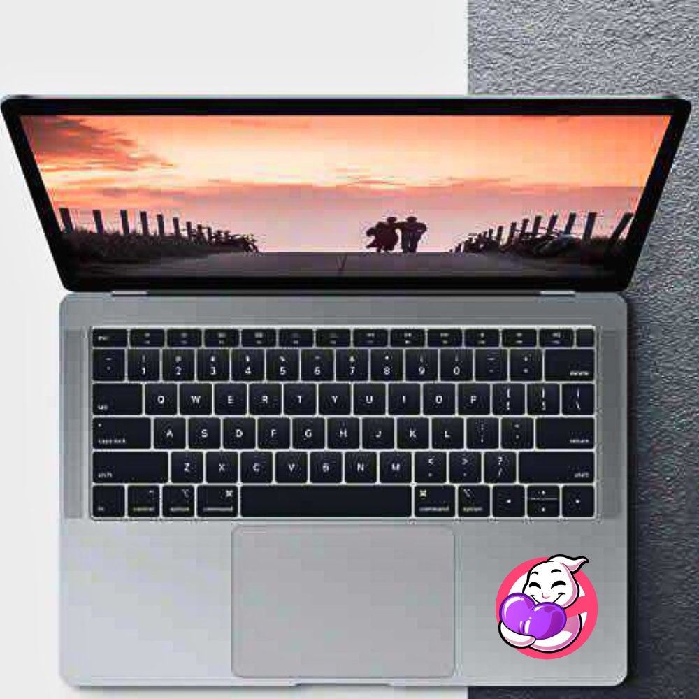 A holographic vinyl sticker featuring a playful ghost hugging a purple heart, inspired by Ghostbusters. Perfect for laptops, water bottles, and notebooks.