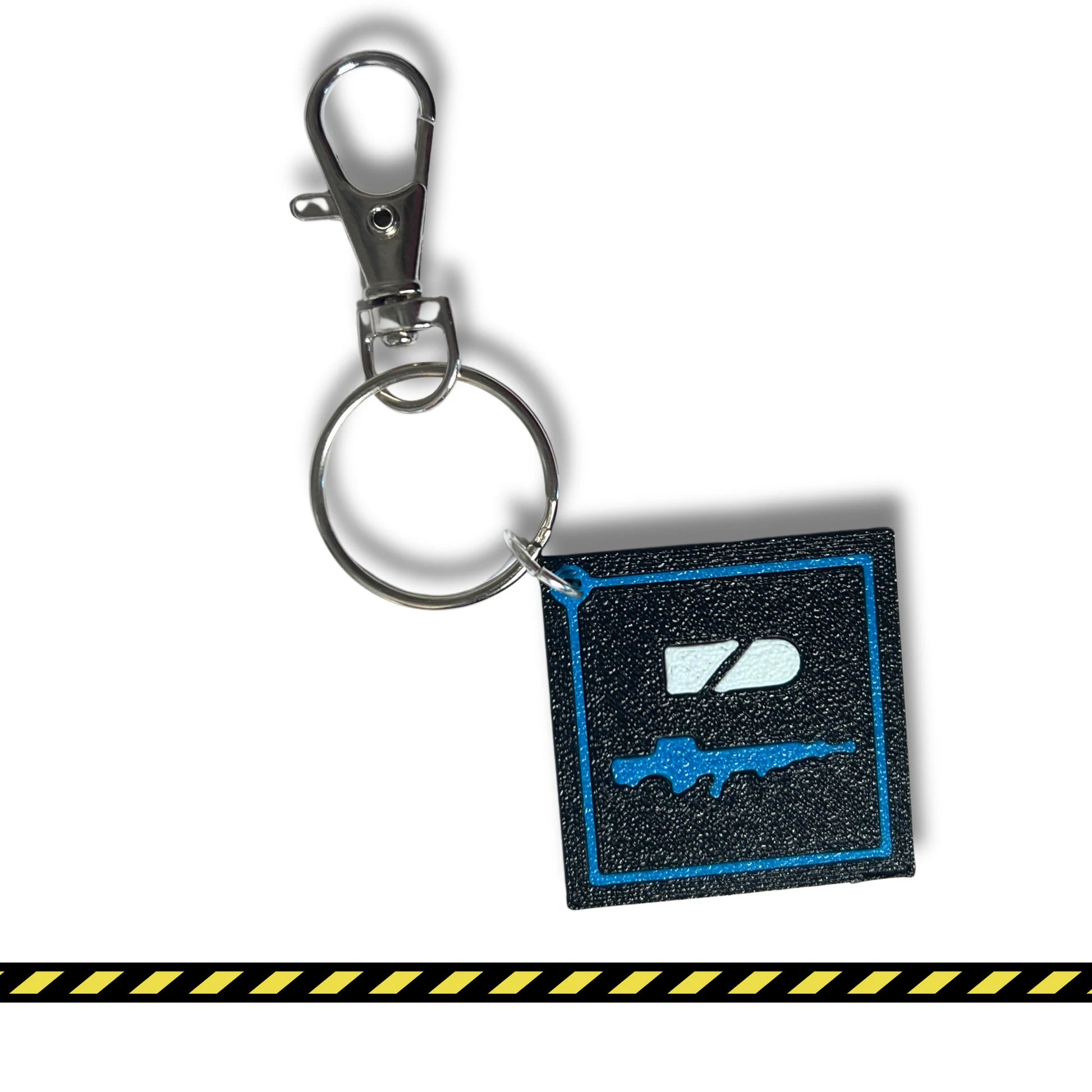 Custom Helldivers keychain featuring the unique stratagem icon, ideal for fans of the game. Made with durable material, perfect for adding to backpacks, keys, or gaming gear. A great gift for Helldivers fans. Featuring the 500kg bomb.