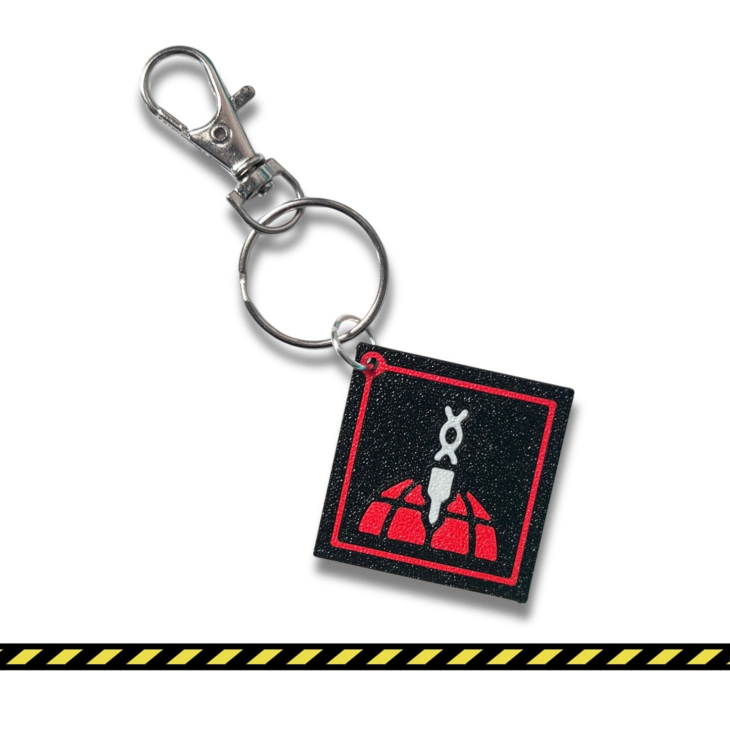 Custom Helldivers keychain featuring the unique stratagem icon, ideal for fans of the game. Made with durable material, perfect for adding to backpacks, keys, or gaming gear. A great gift for Helldivers fans. Featuring the 500kg bomb.