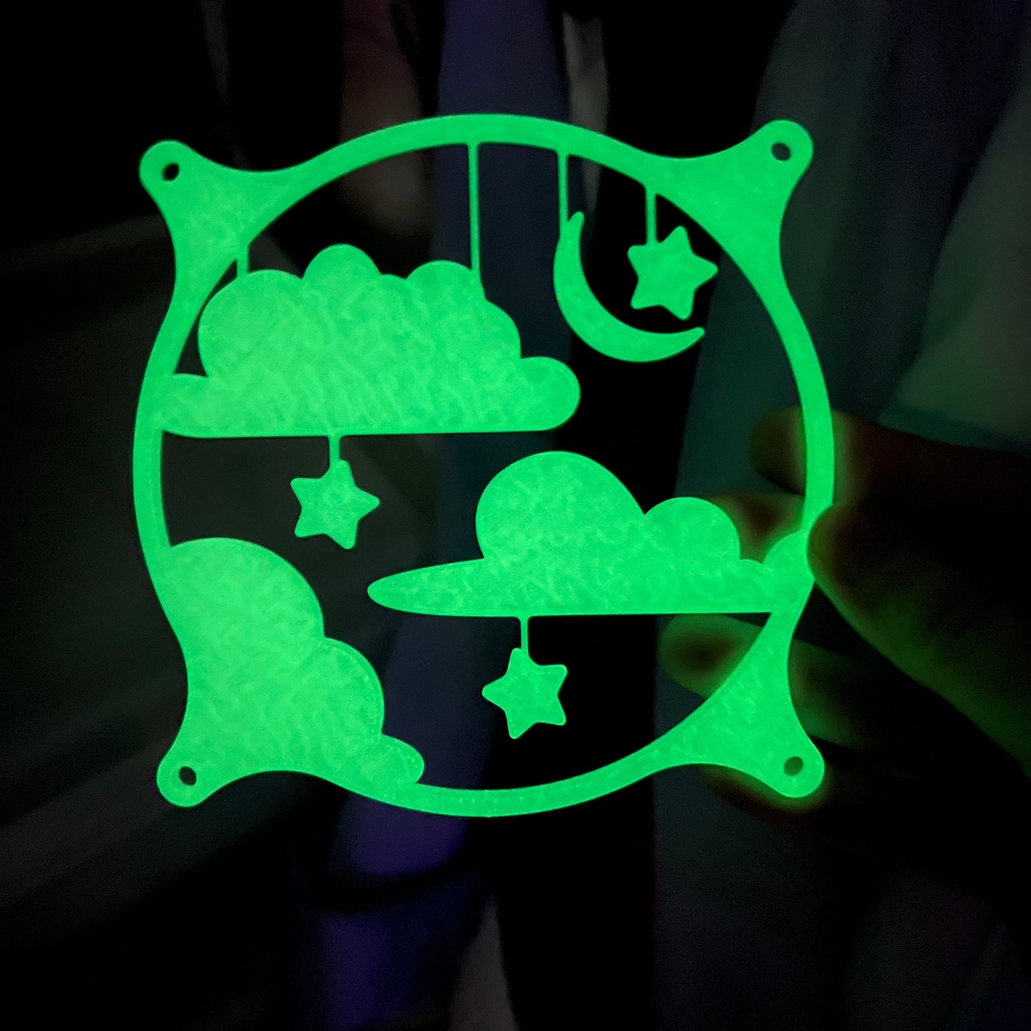 This whimsical 3D printed PC fan grille cover features pastel clouds, stars, and a crescent moon, adding a playful and cute touch to your gaming setup or workspace with a soft, kawaii style.