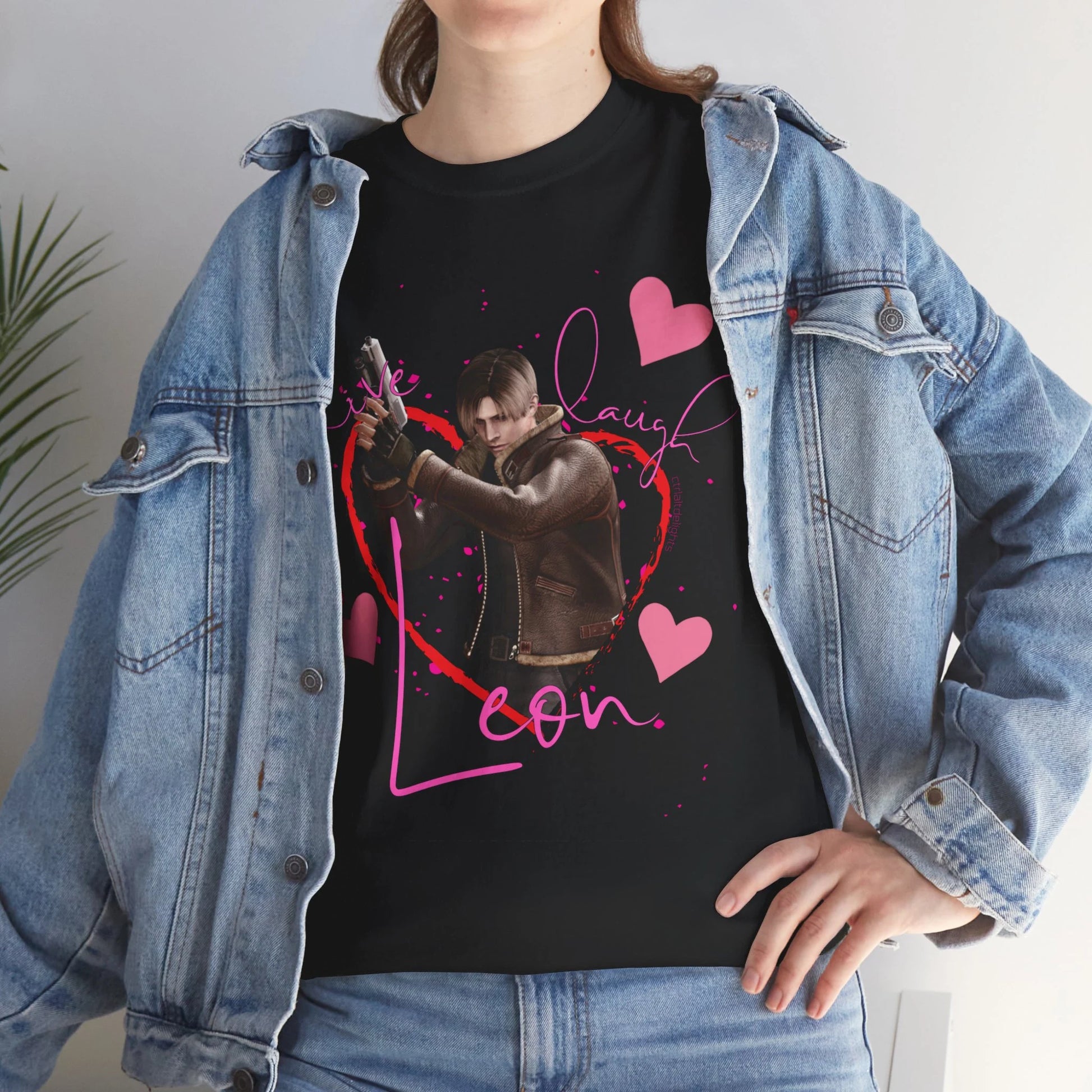 Resident Evil-inspired fan t-shirt featuring Leon S. Kennedy with heart graphics and the text ‘Live Laugh Leon.’ Perfect gift for Resident Evil fans