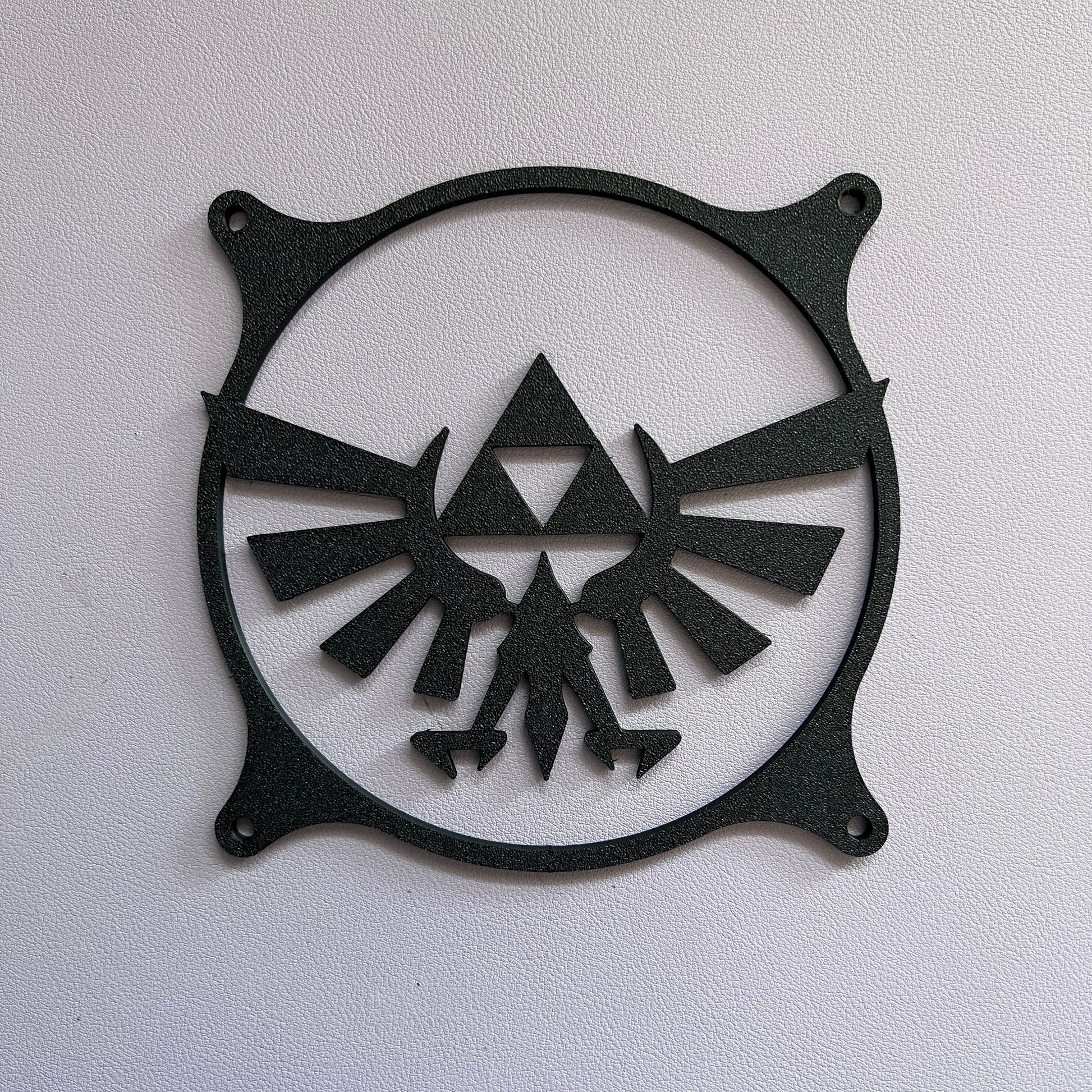 Legend of Zelda decorative PC fan cover with Hylian crest design. Made from durable material and perfect for gaming PC builds with a unique, custom touch.