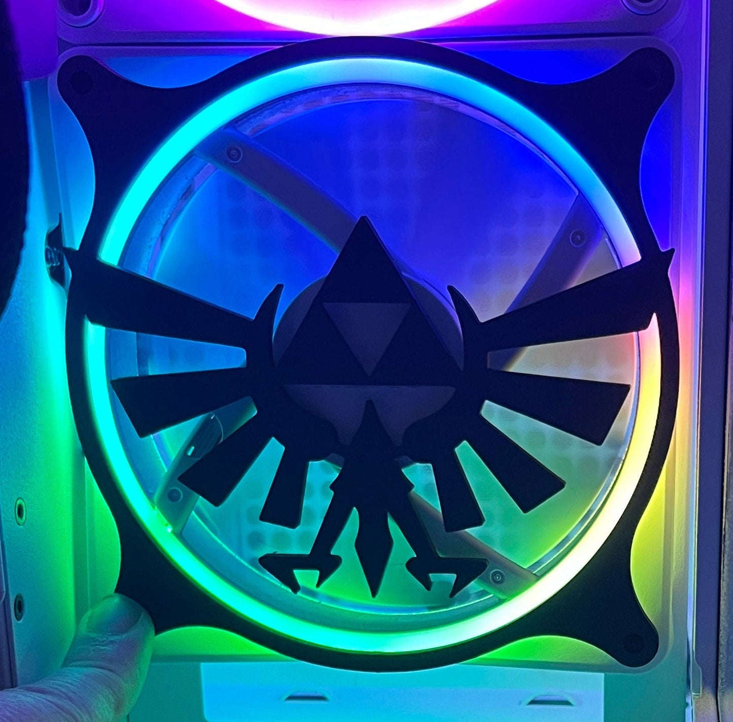 Legend of Zelda decorative PC fan cover with Hylian crest design. Made from durable material and perfect for gaming PC builds with a unique, custom touch.