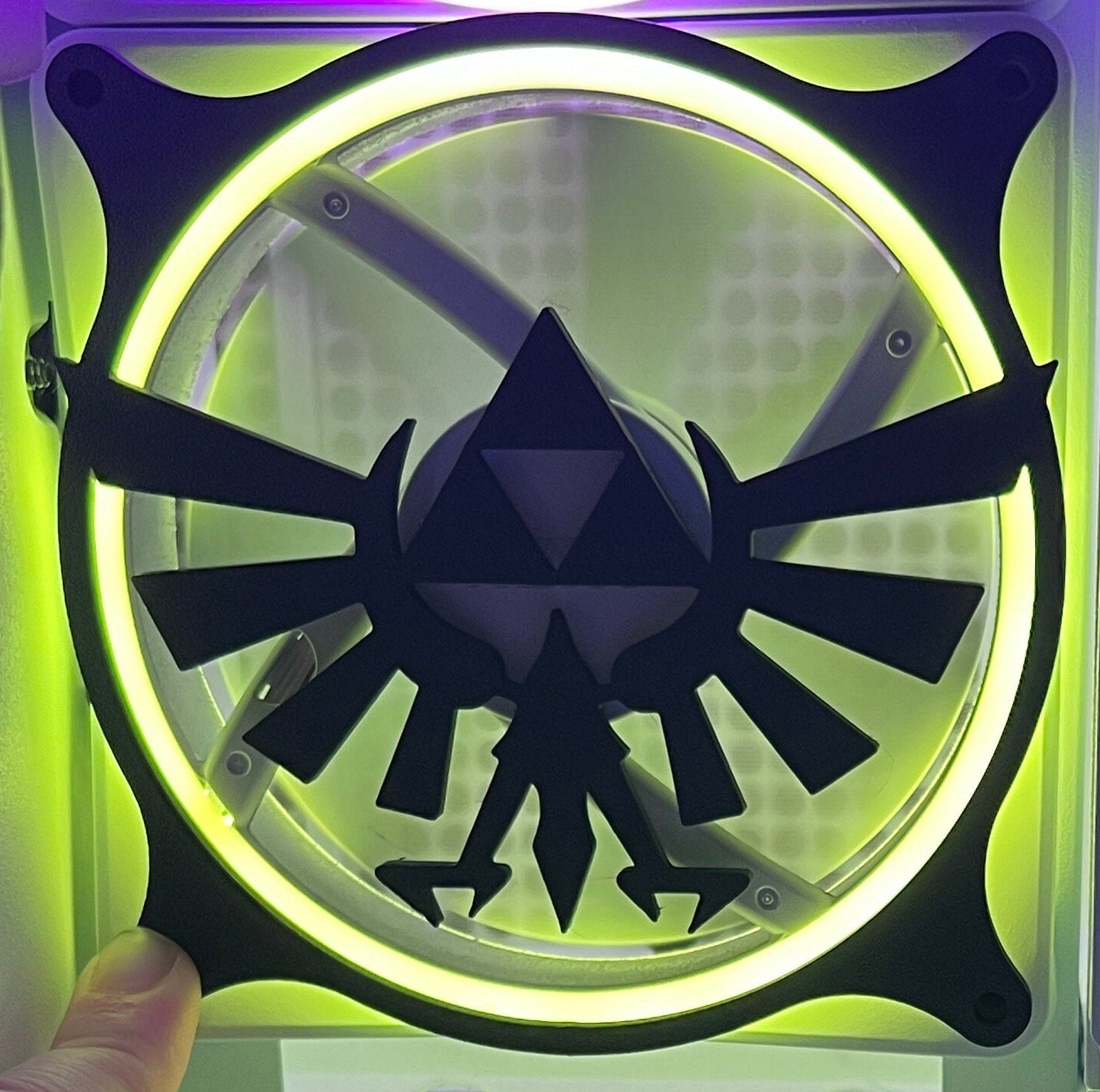 Legend of Zelda decorative PC fan cover with Hylian crest design. Made from durable material and perfect for gaming PC builds with a unique, custom touch.