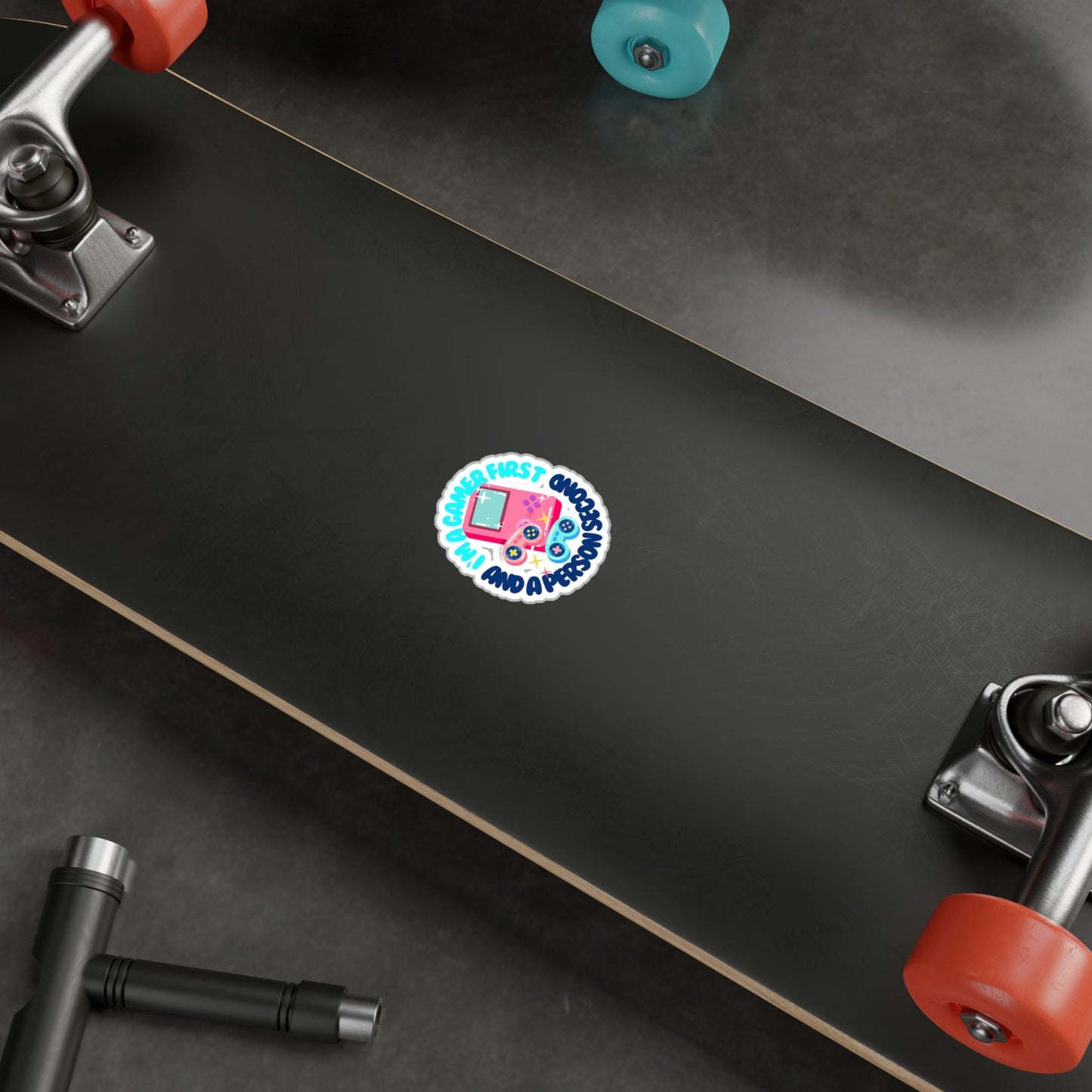 Colorful gaming sticker featuring a playful "I'm a Gamer First, Person Second" design. Perfect for personalizing laptops, water bottles, and gaming consoles. Great gift for gamers and geeks alike!