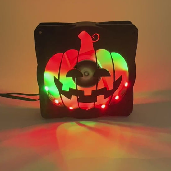3D printed PC fan grill shaped like a spooky jack-o'-lantern pumpkin. Perfect Halloween-themed case mod for gamers and tech lovers.